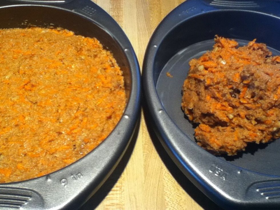 Cut the batter in half and scoop into two, well greased, 9-inch circle pans. Smooth the tops.