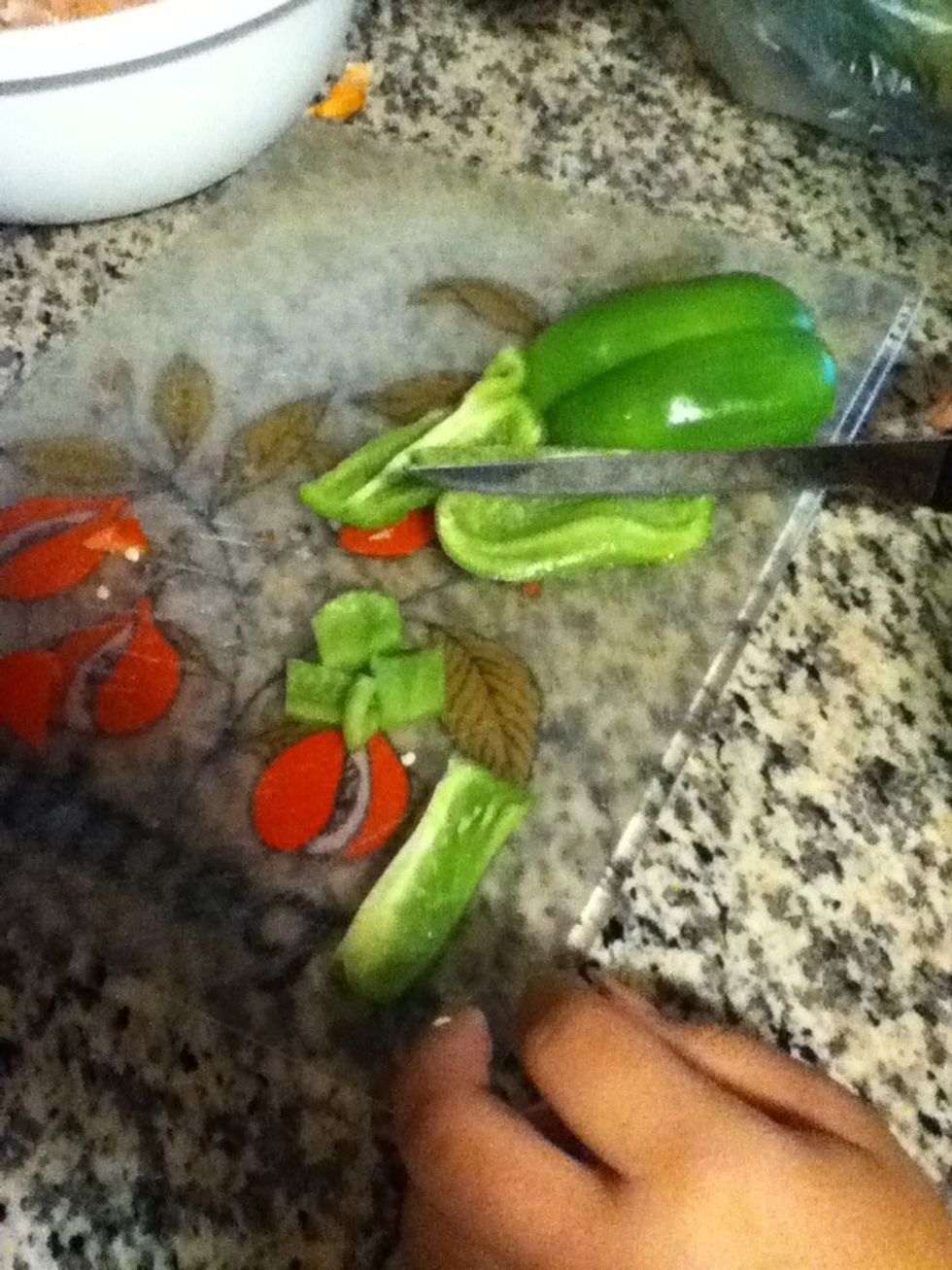 Cut the bell peppers in small pieces. You can use red or green ones.