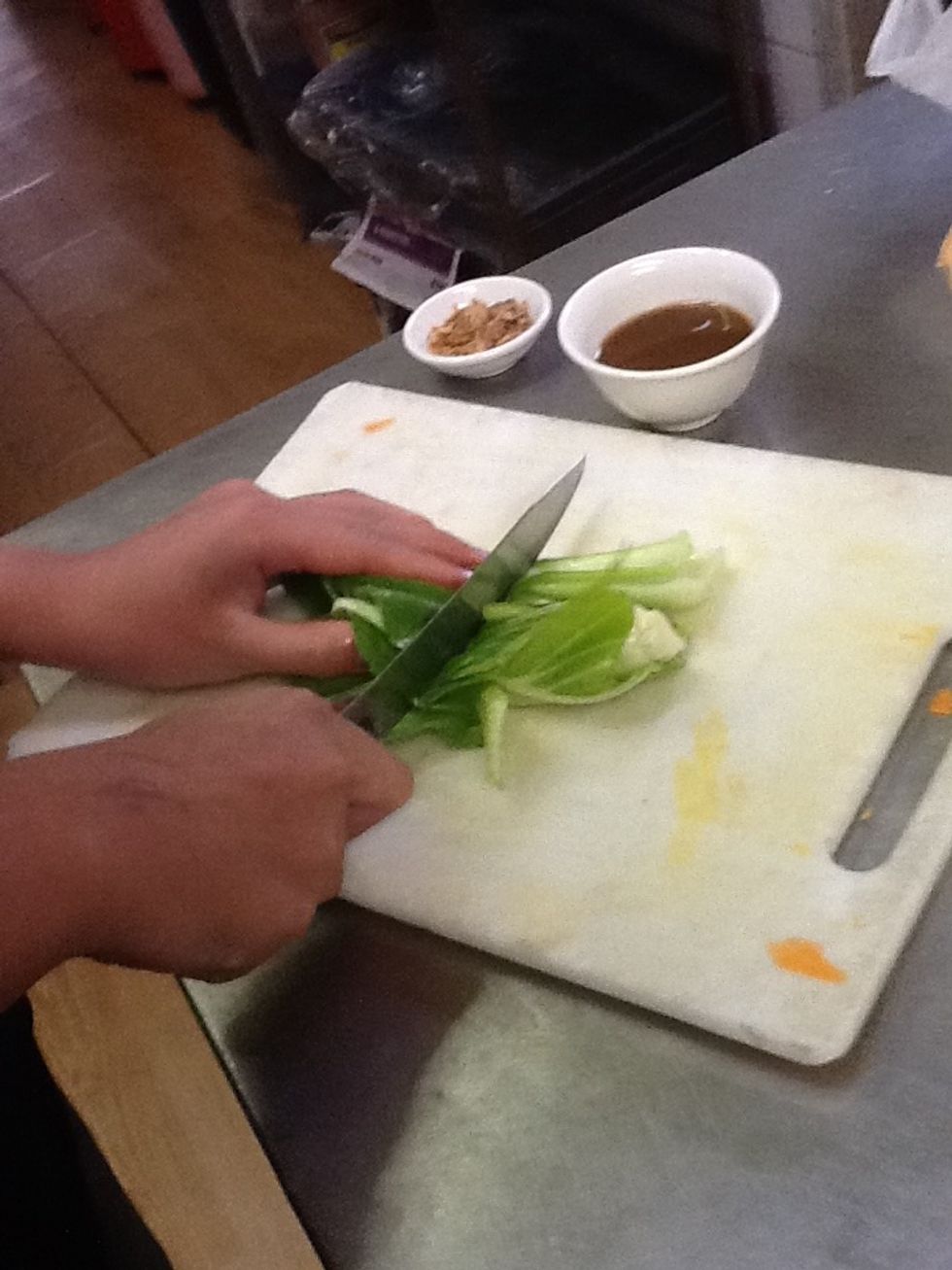 Cut the bok choy in half
