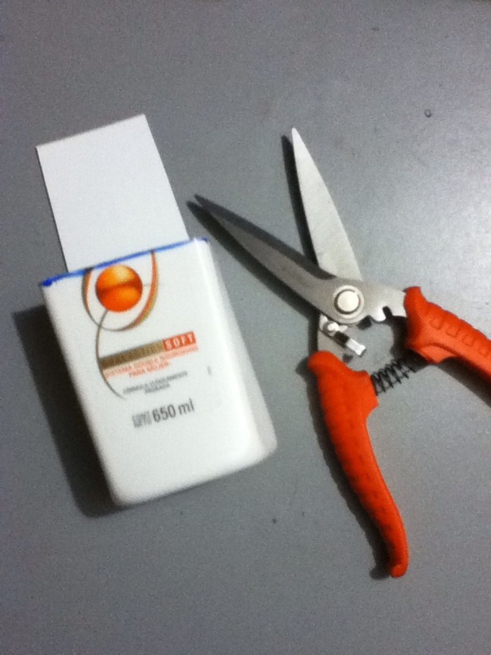 Cut the bottle following the marks with a good scissors.