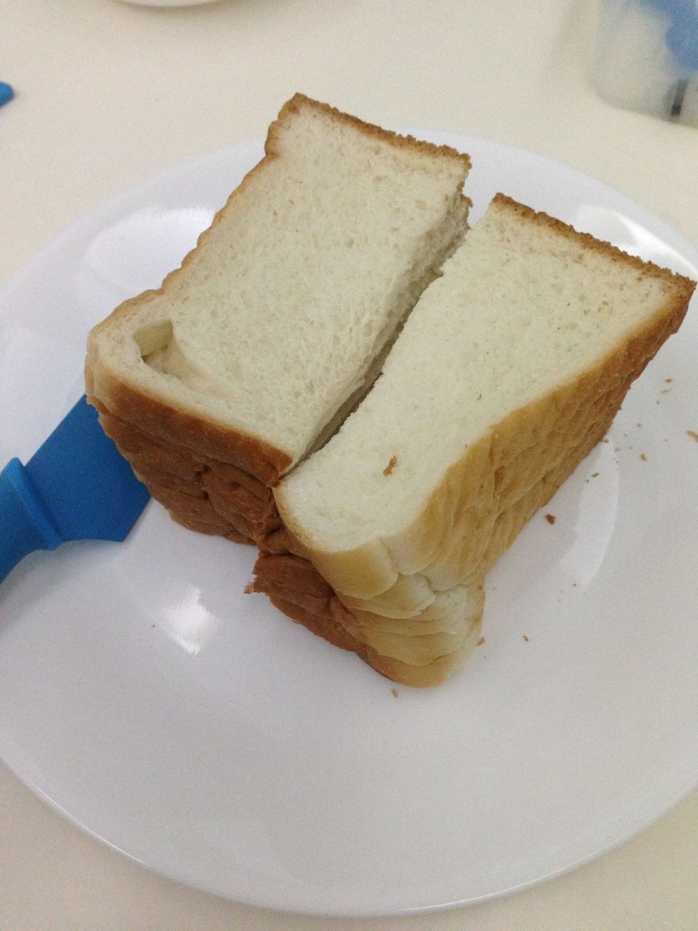 Cut the bread into manageable sizes