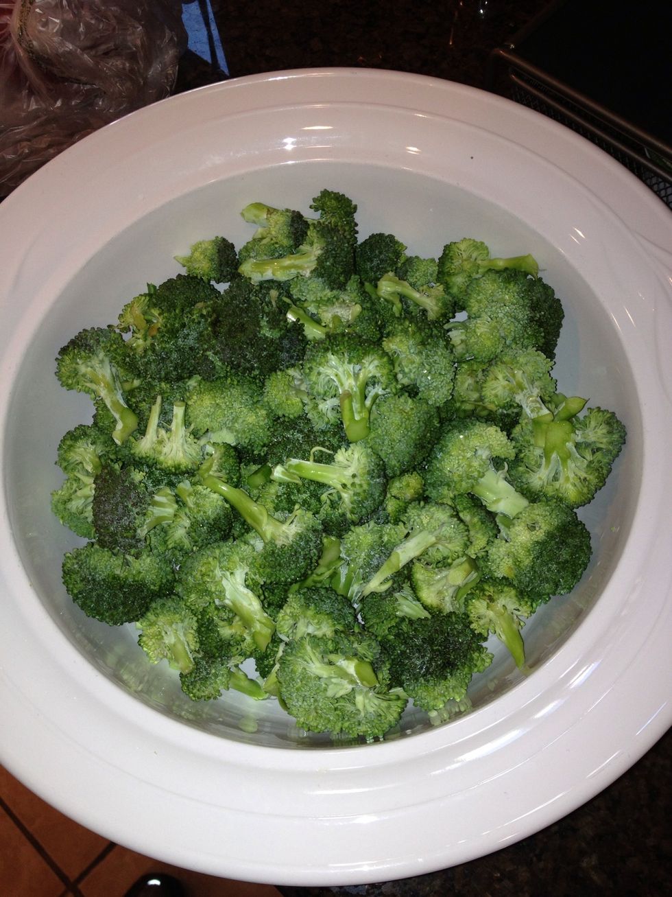 Cut the broccoli into bite-sized pieces.