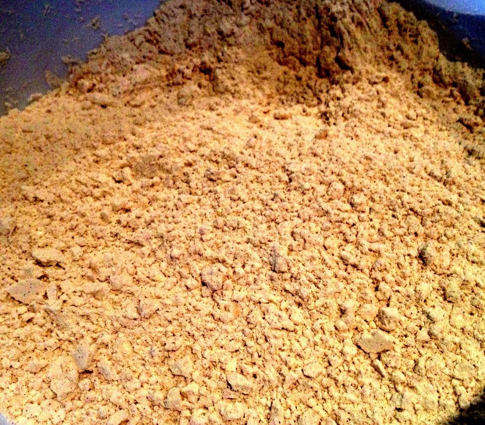 Cut the butter in using a pastry cutter, two knives, or a fork - whatever works for you. You're going for a grainy look to the mix - small pieces like this show you have the butter incorporated.