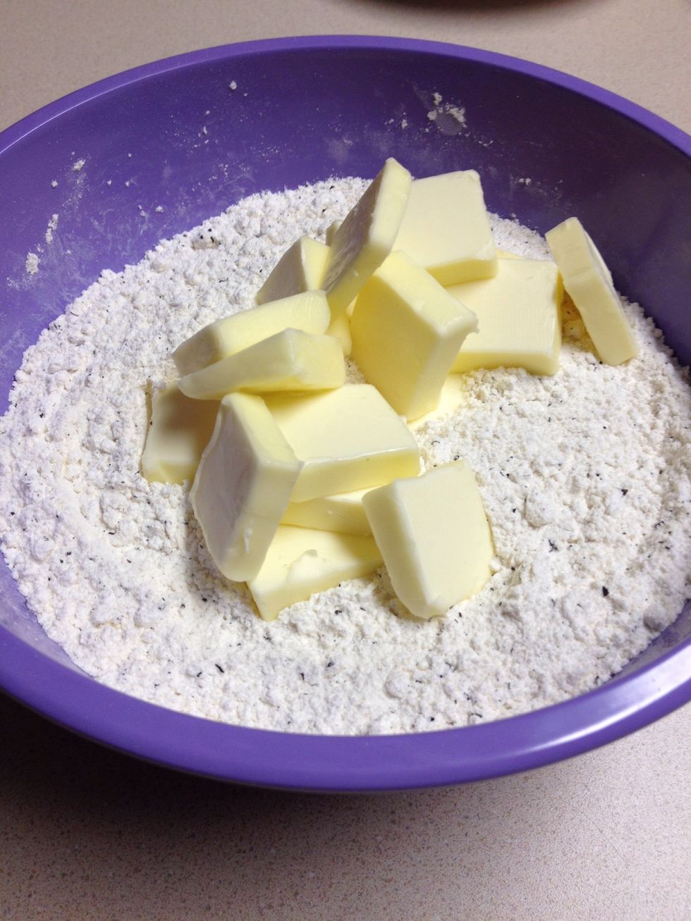 Cut the butter into the flour until you get pea-sized pieces (don't be afraid to use your hands!)