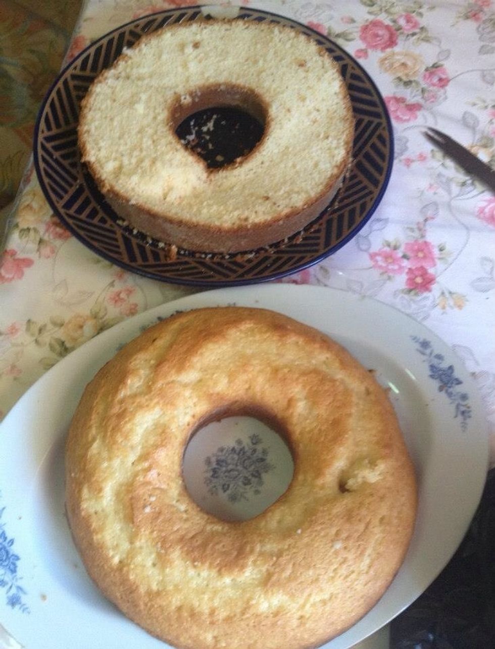 Cut the cake in half