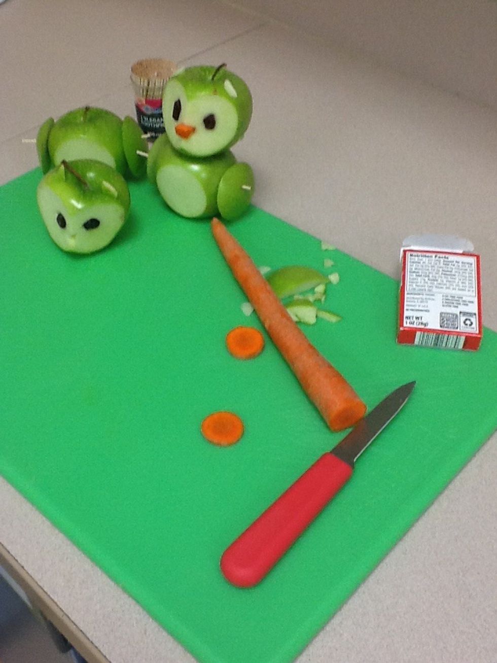 Cut the carrot to make an owl nose