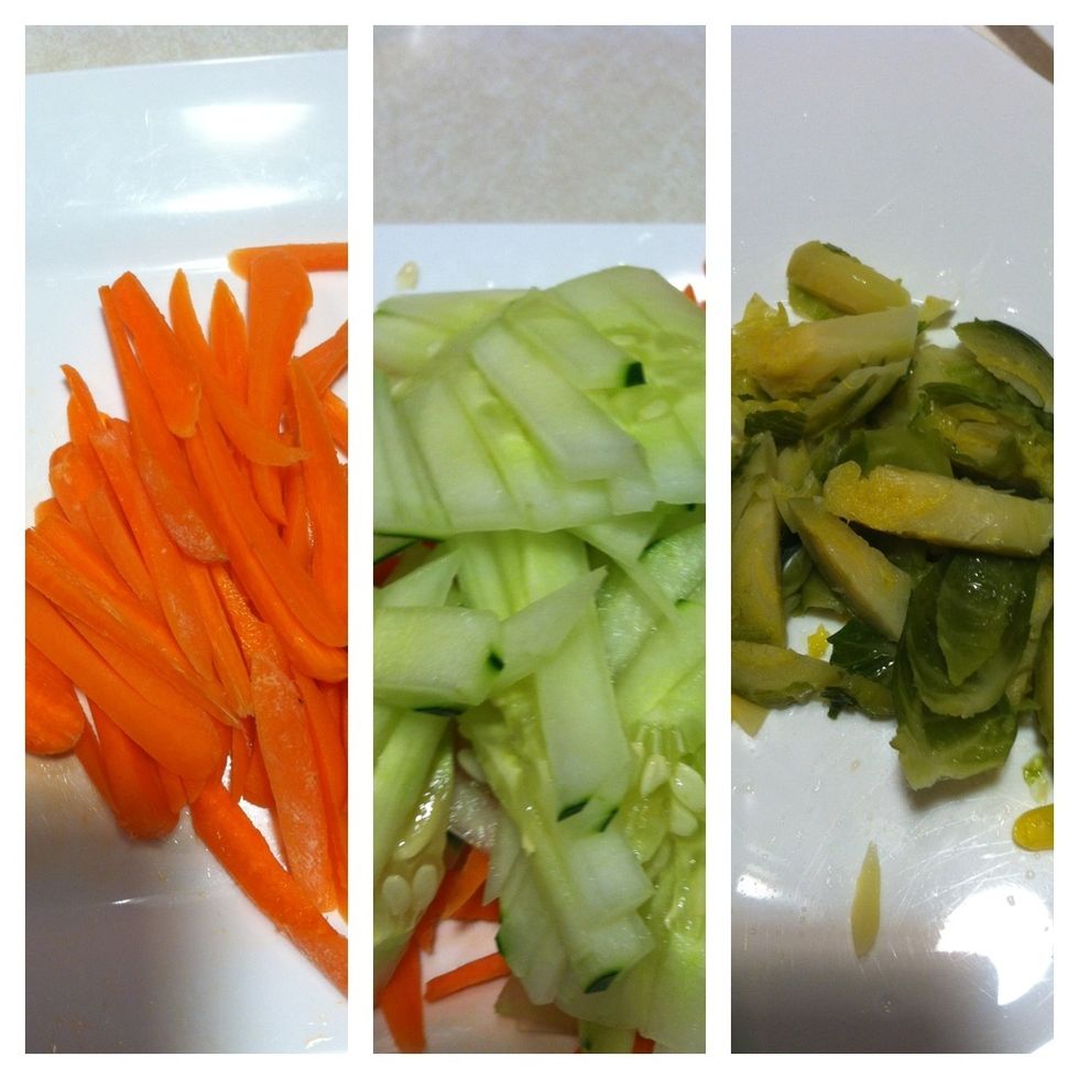 Cut the carrots, cucumber, and Brussels sprouts as shown.