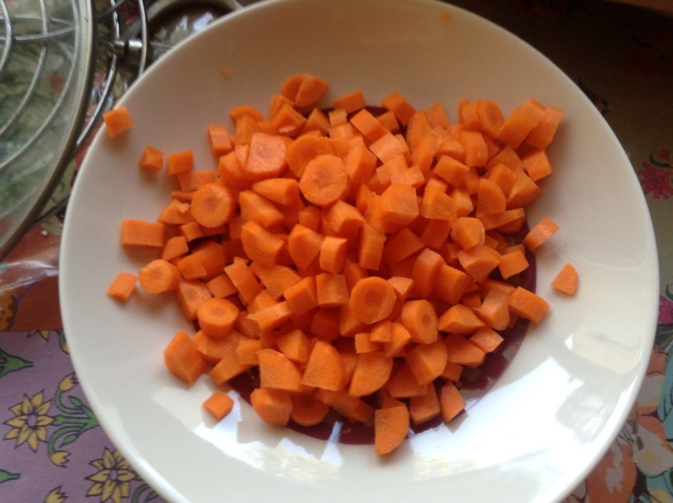 Cut the carrots into dices
