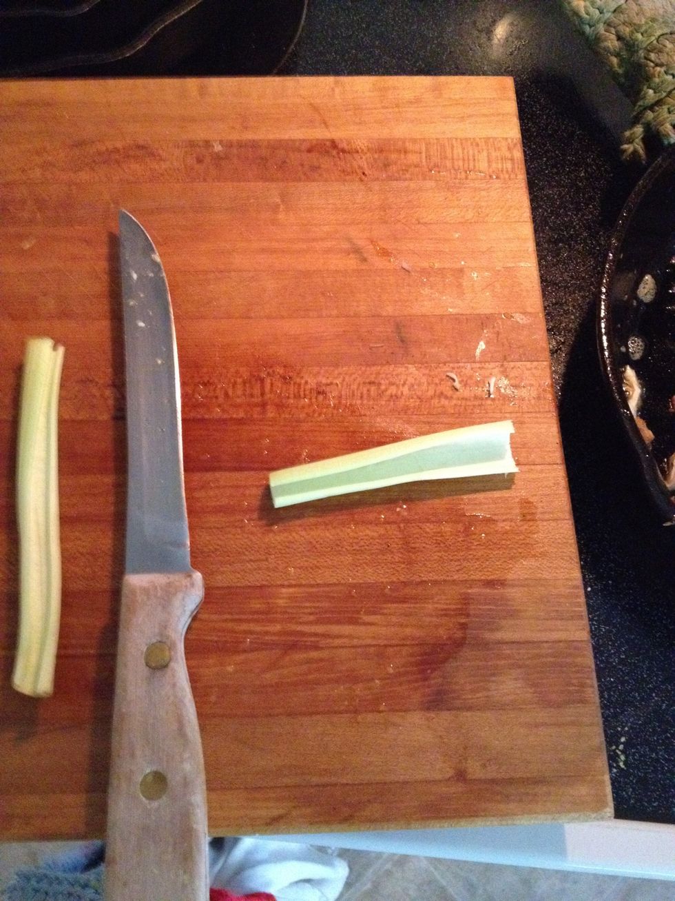 Cut the celery into bite sized slices. They should be about the same size as the bits of chicken.  Add to the chicken in the pan and stir.