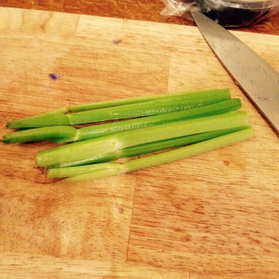 Cut the celery lengthwise and then chop into pieces