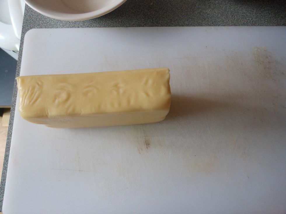 Cut the cheese in half.