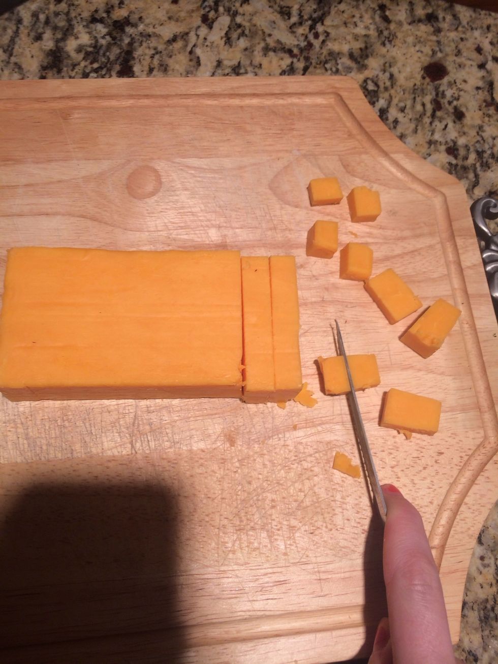 Cut the cheese into bits