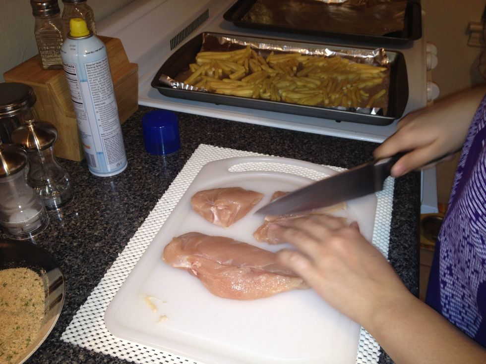 Cut the chicken into bite sized pieces. Set aside and discard any fat or undesirable pieces.