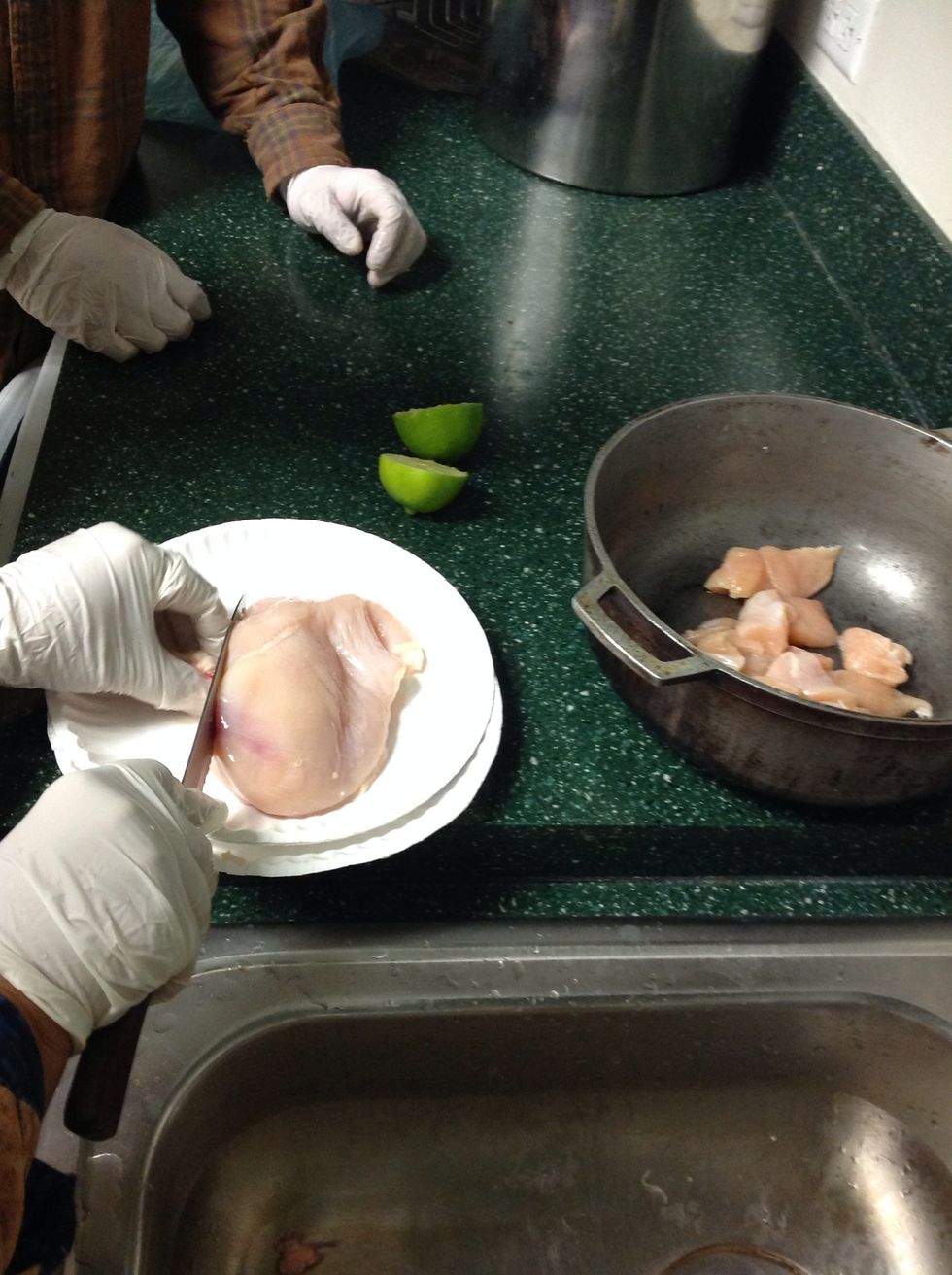 Cut the chicken into small pieces and put into pot