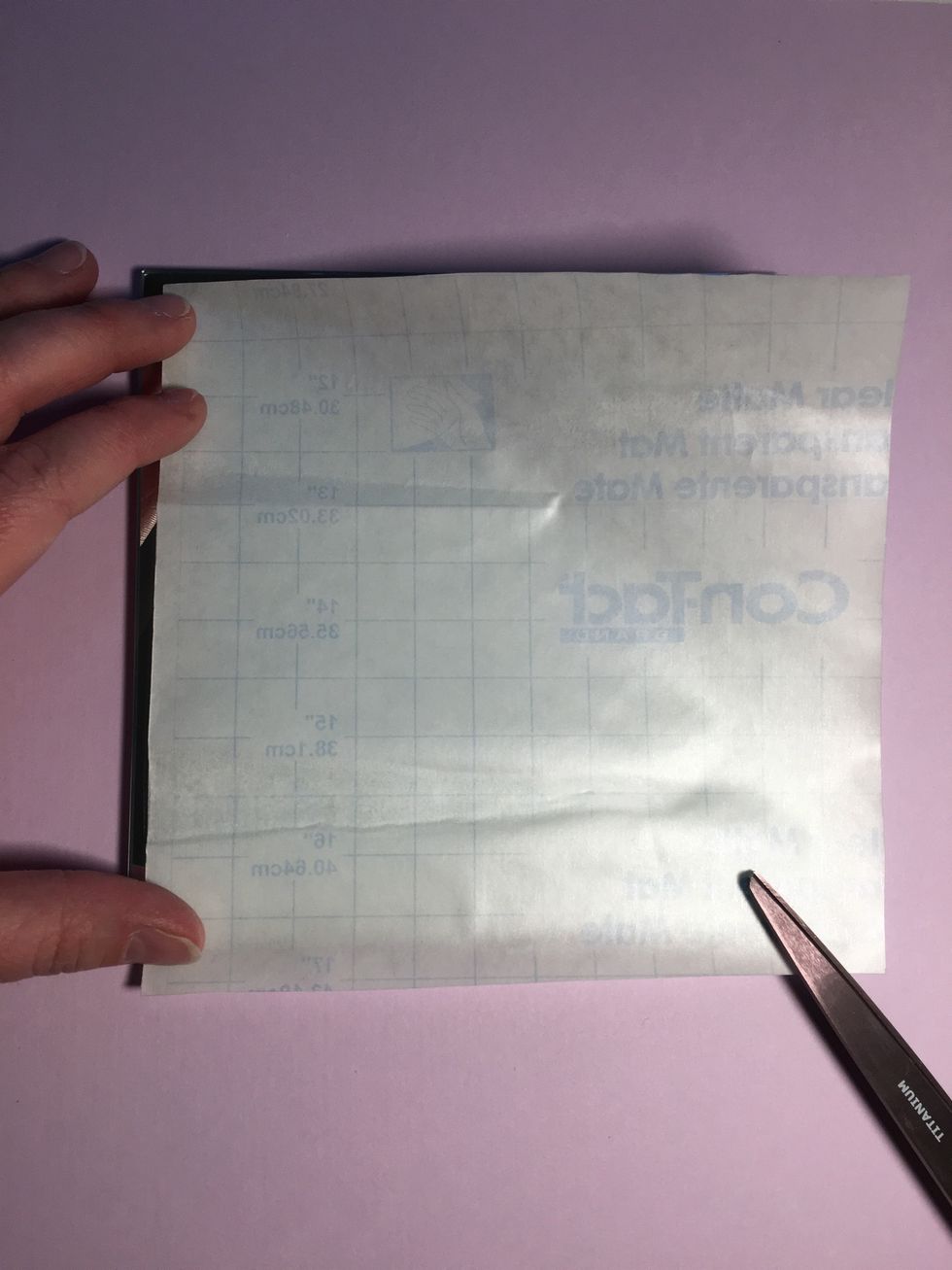 Cut the Contact paper to size. For small mirrors, I recommend covering the entire surface.