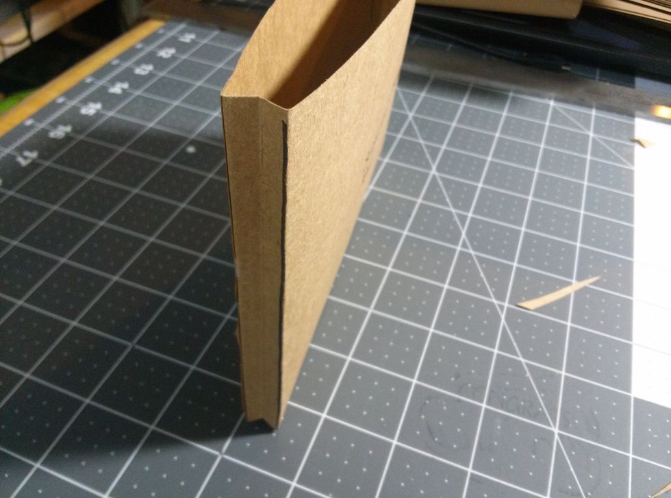 cut the corners at an angle on the 2 corners that are intact to make it easier to create the gussets.