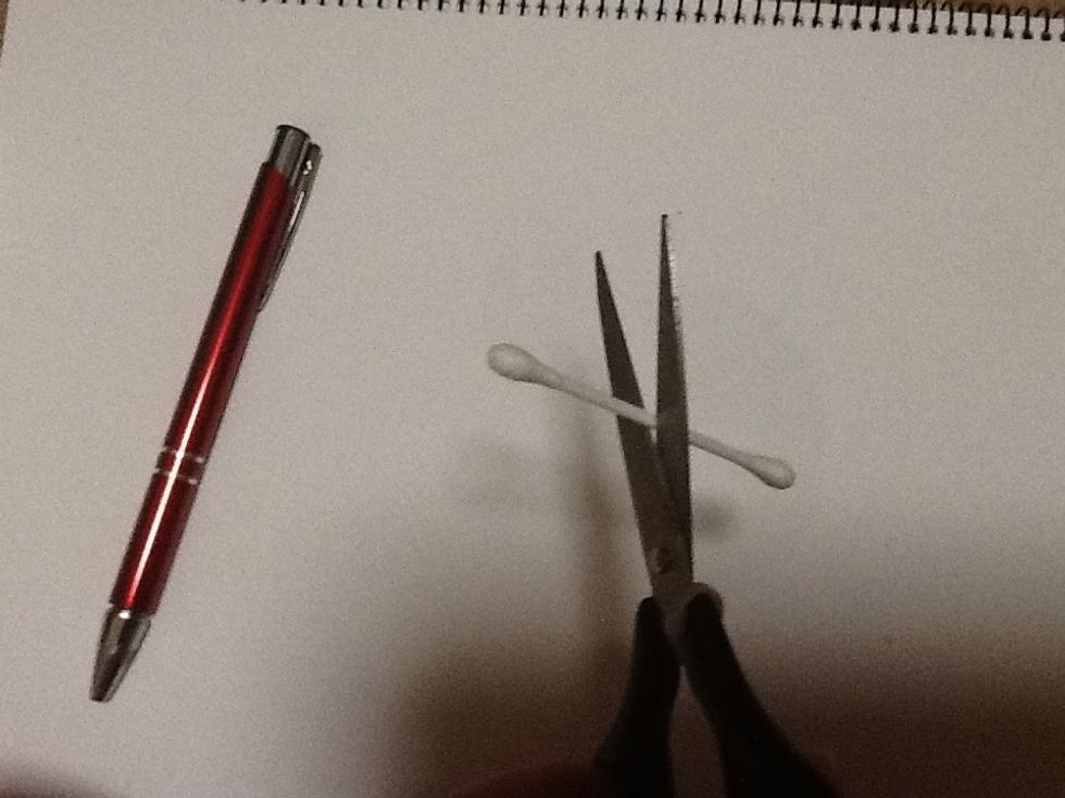 Cut the cotton bud in half.