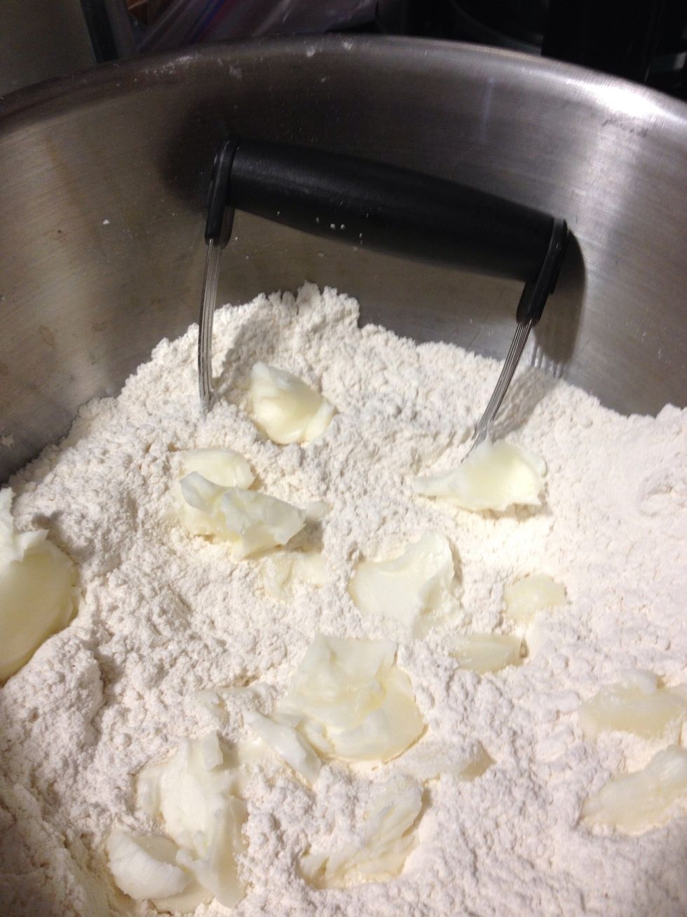 Cut the Crisco into the flour mixture. I recommend only putting a half cup or so into the bowl at one time and in small spoonfuls.