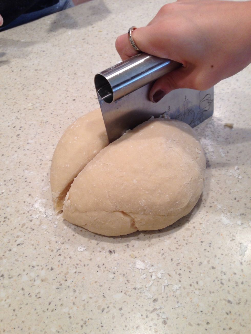 Cut the dough in half, make both halves into dough balls, and set aside