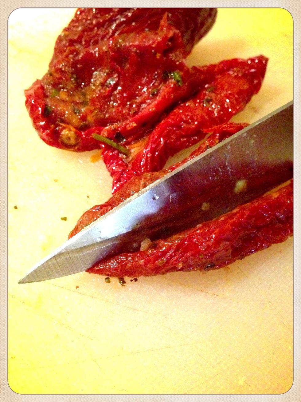 Cut the dried tomatoes to small pieces.