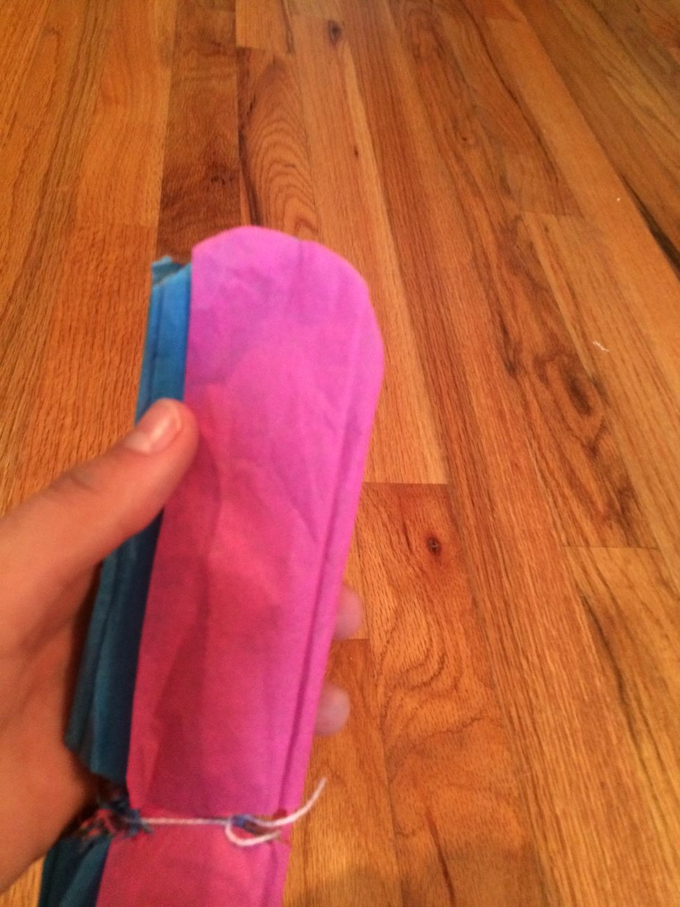 Cut the edges to form a curve.