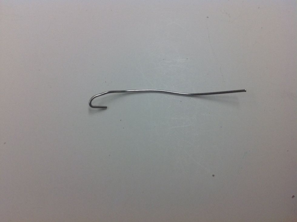 Cut the end off of your head pins. Use the pliers to form a small hook on one end.