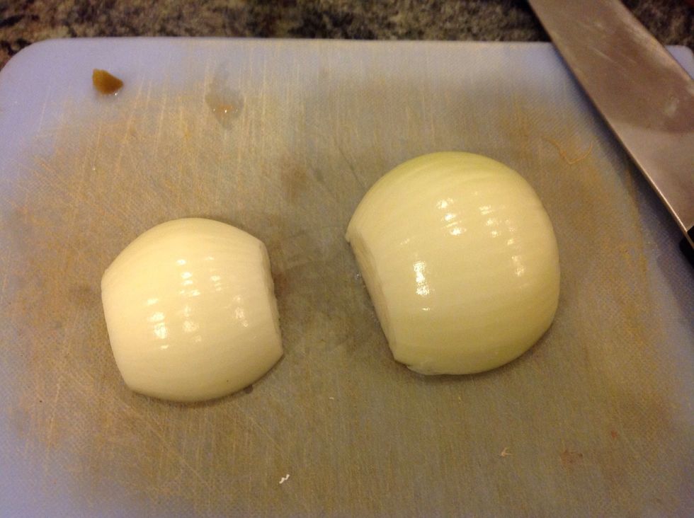 Cut the ends off both halves of the onions.
