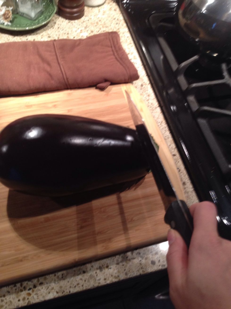 Cut the ends off of the eggplant.