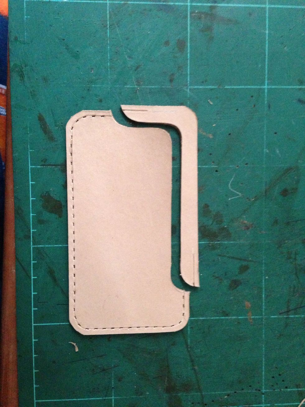 Cut the excess leather for the opening of the case like so..
