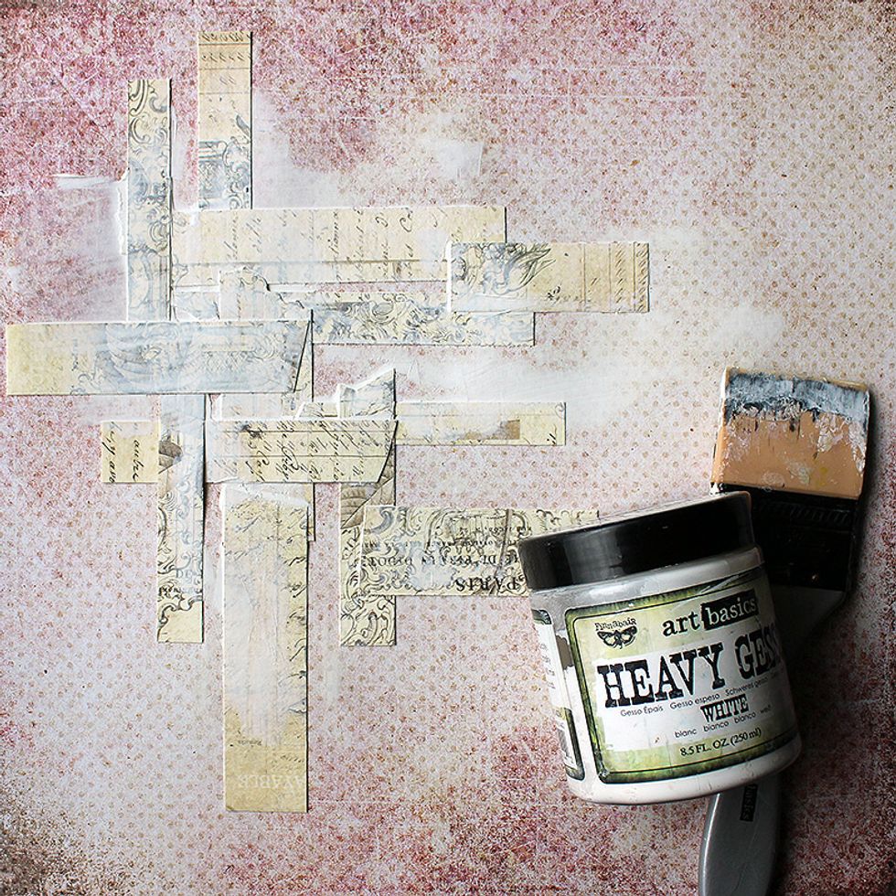 Cut the extra pieces you were left with in previous step to rectangles and layer them to your background. Then add a thin coat of white gesso on top.
