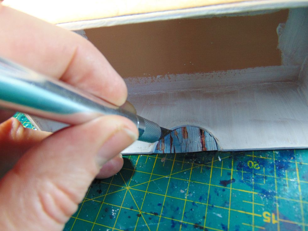 Cut the finger pull out with a craft knife....