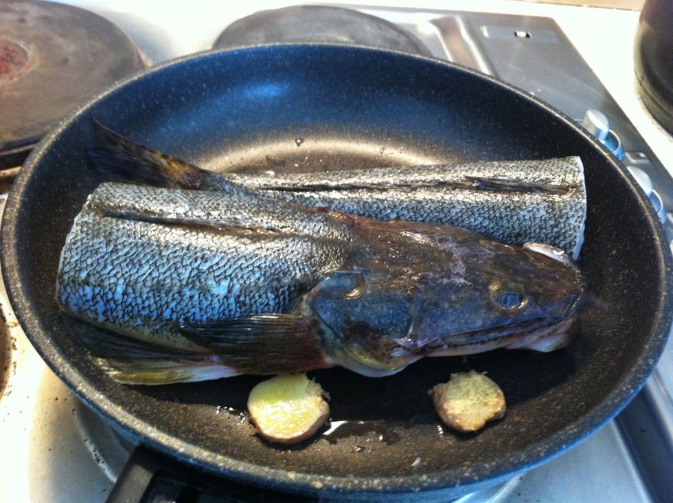 Cut the fish into halves if necessary to fit into the pan.