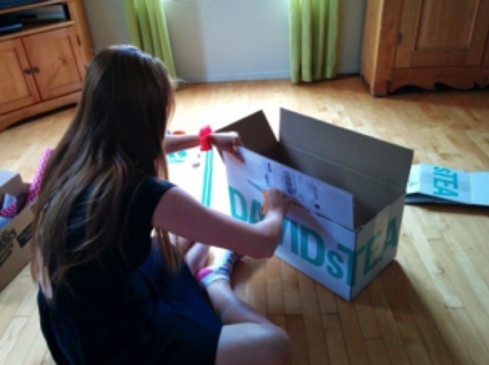 Cut the flaps off of the box and put them to the side for later.