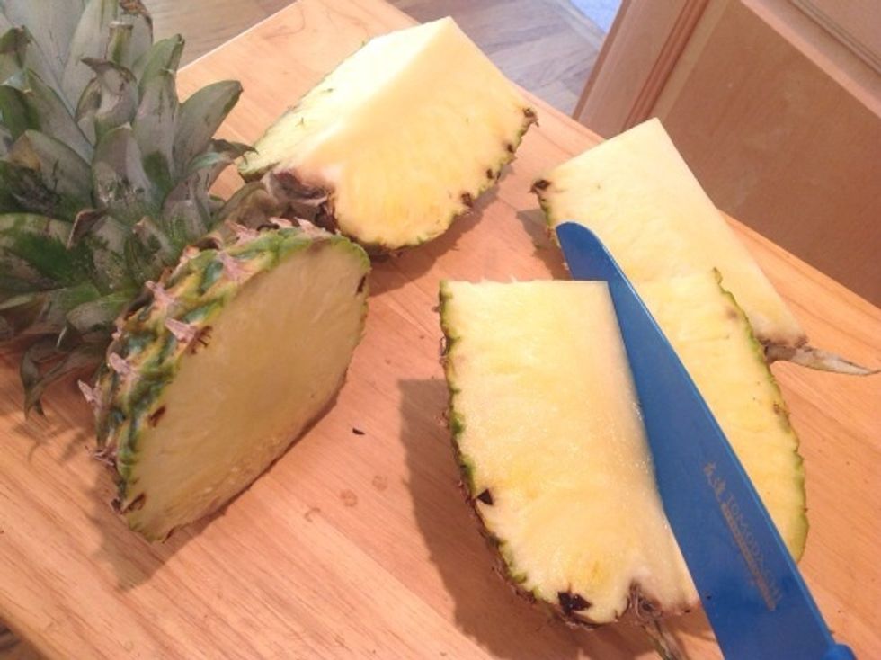 Cut the flesh into quarters.