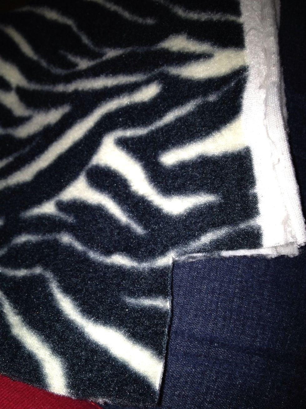 Cut the four corners 2x2in for lap throw or 4x4in for blanket.