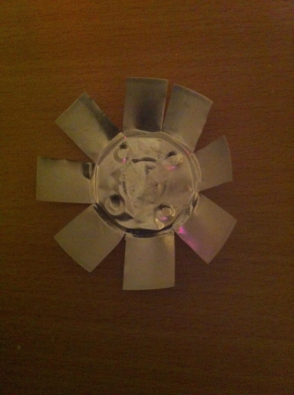 Cut the four squares one more time each.