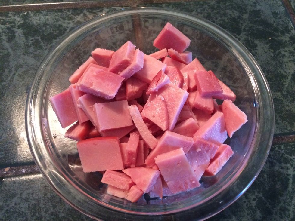 Cut the ham steak into nice hearty chunks and leave aside while everything else cooks away. I add the ham later.