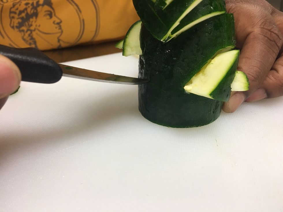 Cut the hole just like you cut the wings and feather but make it small, not TOO small.