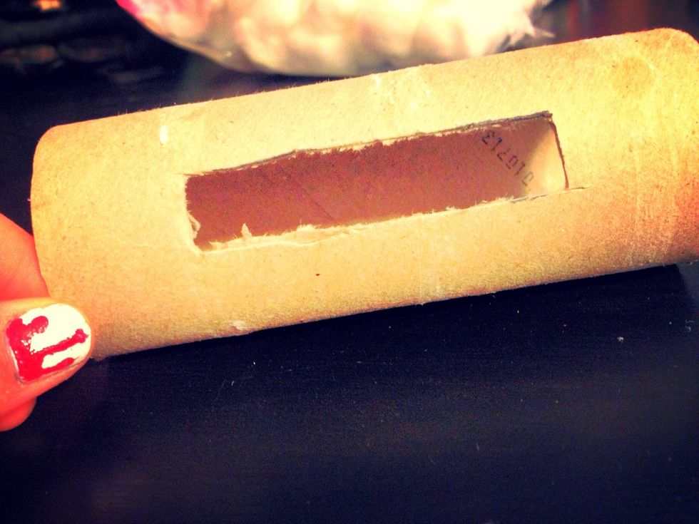 Cut the hole out with scissors or an exacto knife