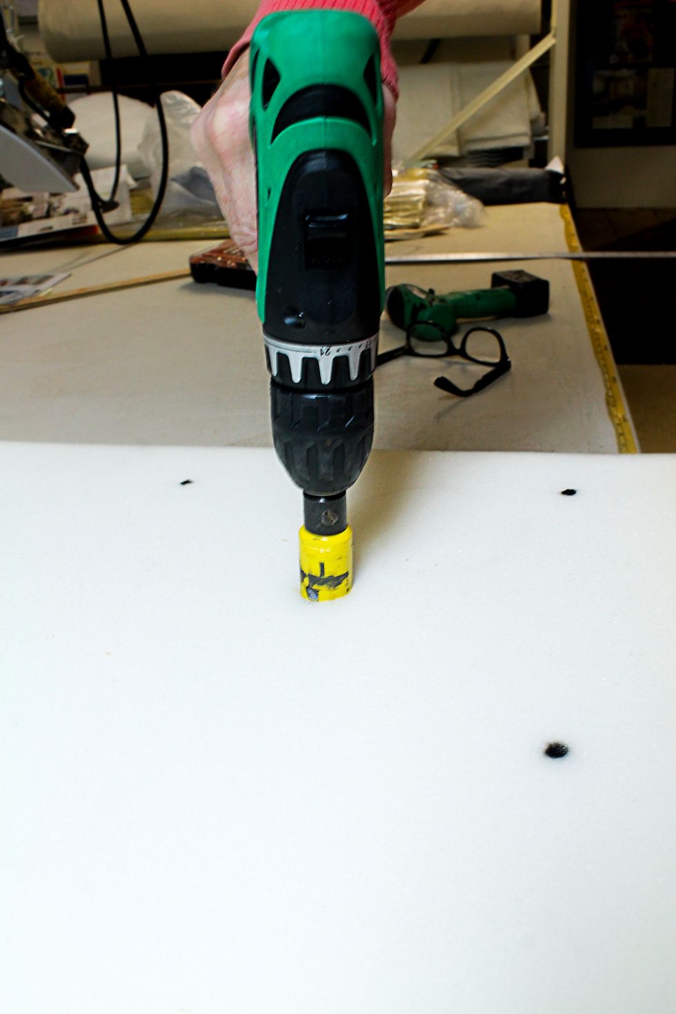 Cut the holes in the foam about 2" deep. A serrated edge knife works great unless you have one of these.