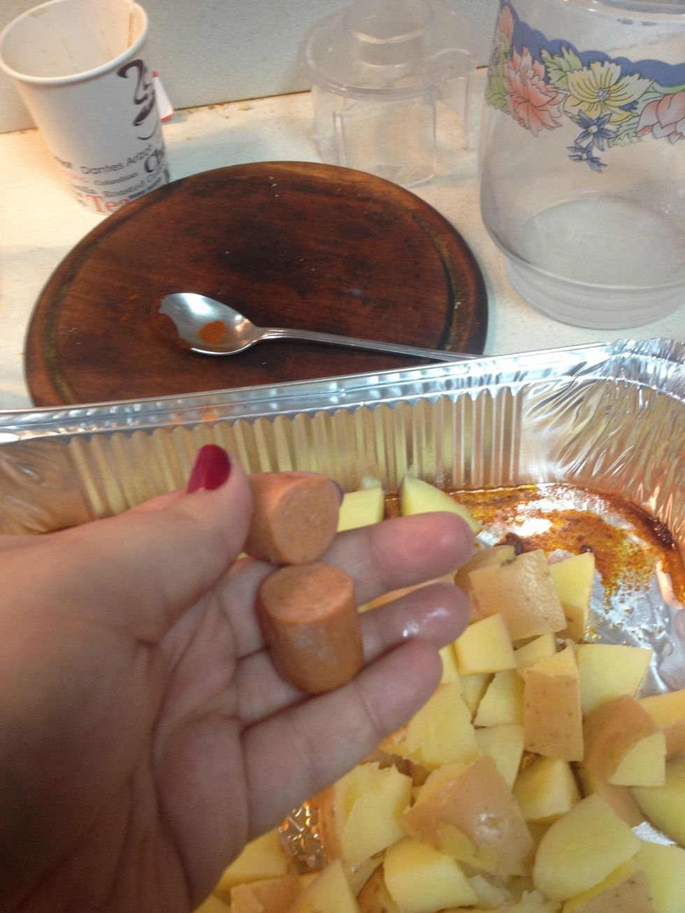 Cut the hot dogs in half and add to the tray also