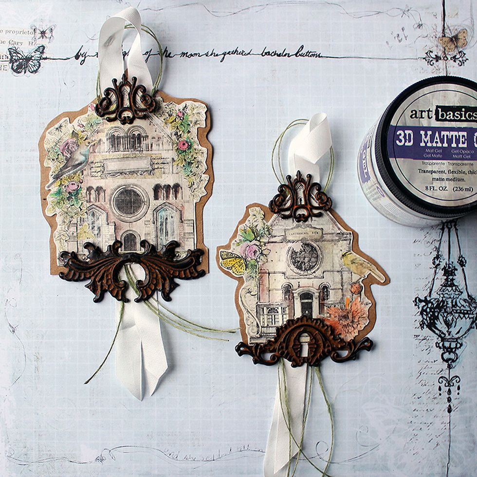 Cut the house outlines out - be careful not to cut the ribbon, nor Jute Trim! Then adhere the metal embellishments in place using 3D Gel.