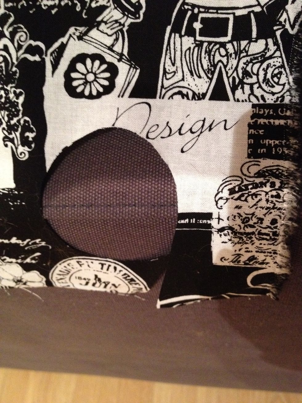 Cut the image out of the fabric cropping it as closely as you can.