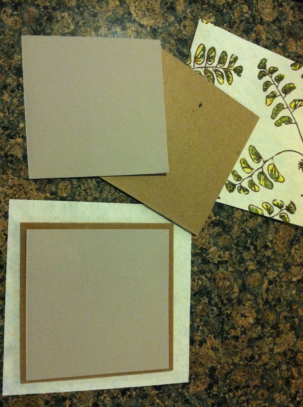 Cut the inside cover paper 1/8 - 1/4 smaller than the cardboard/book board