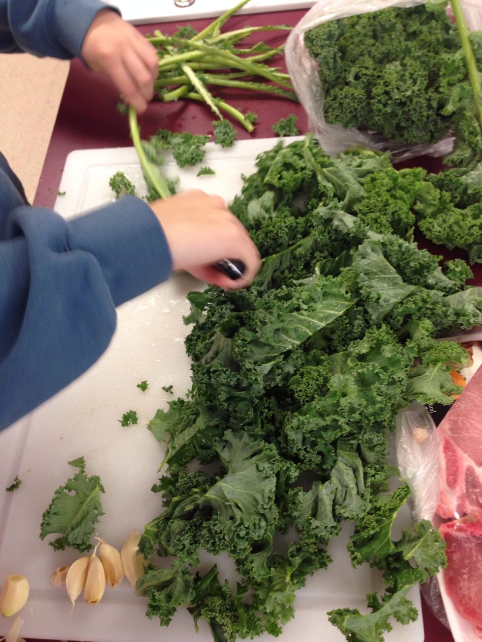 Cut the kale off the stocks
