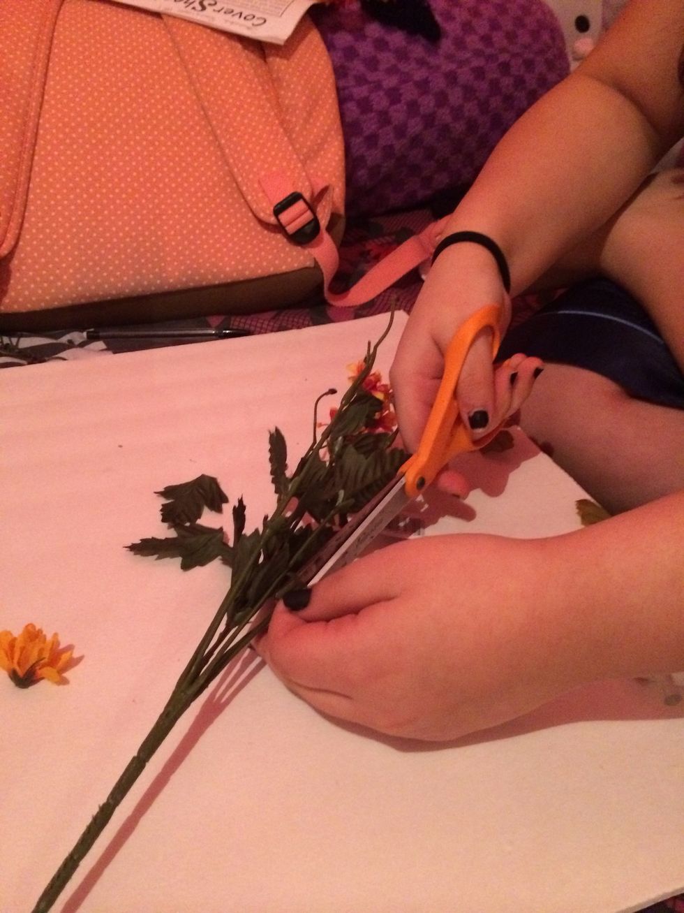 Cut the leaves off of the bouquet.