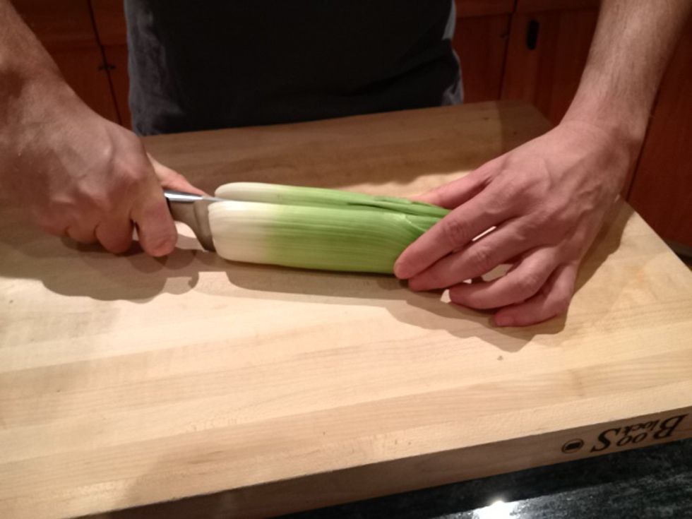 Cut the leek in half the long way.