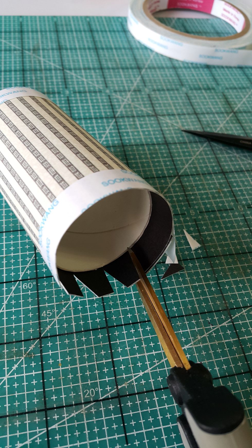 Cut the leftover 1/2" into shapes, which make easier for you to fold and adhere