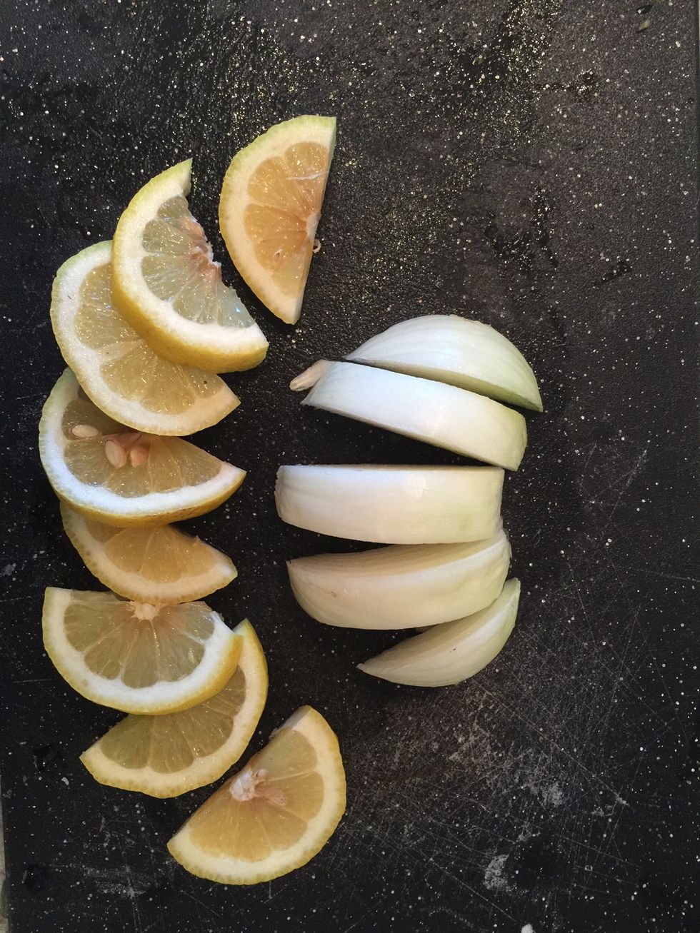 Cut the lemon and onion for stuffing