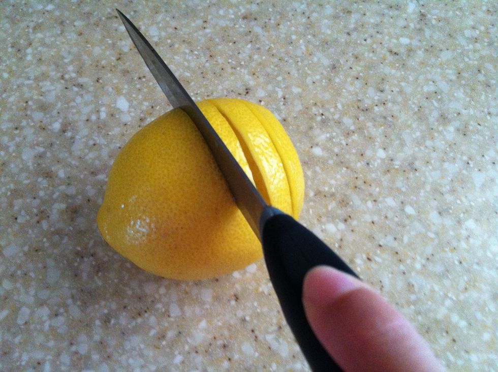 Cut the lemon into slices, you don't have to use a whole lemon